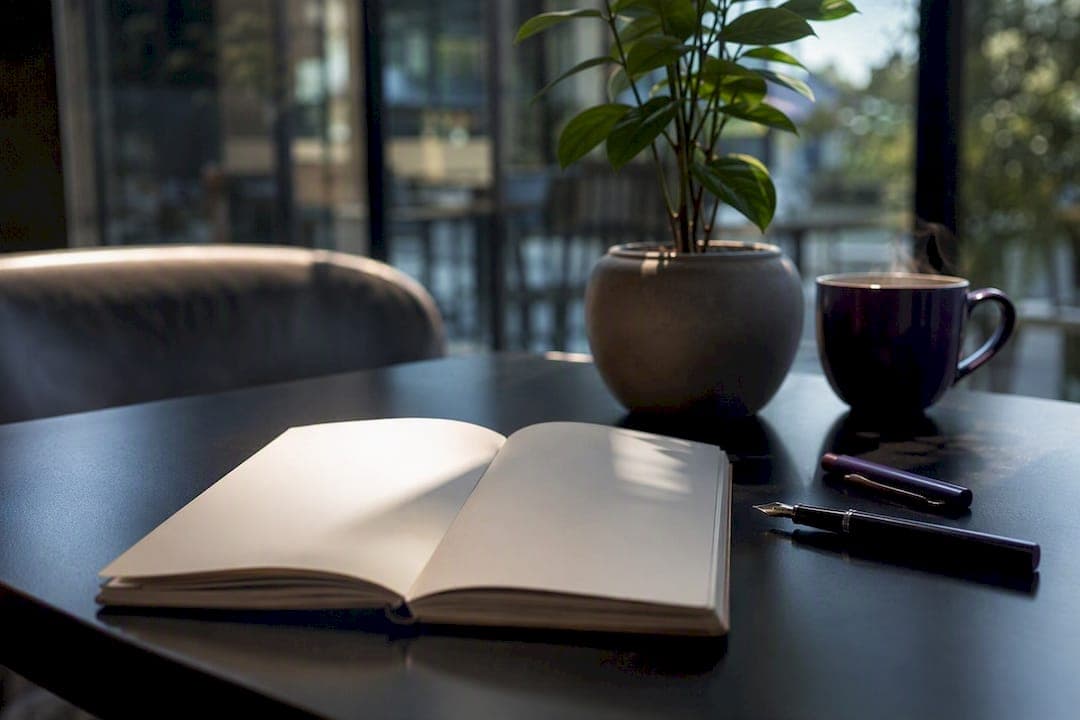 Empty journal and coffee cup for sensory writing
